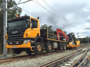 Flat bed crane truck