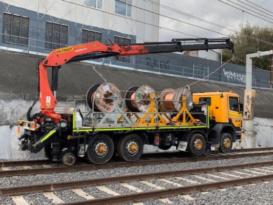Flat bed crane truck