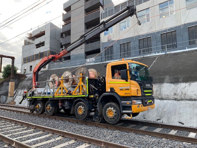 Flat bed crane truck